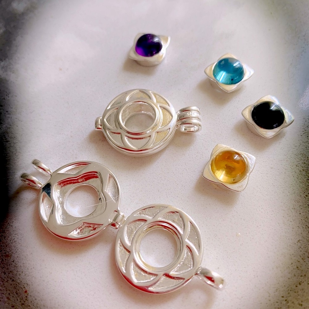 Sterling Silver pendant with Amethyst, Citrine, Blue Topaz and Black Onyx.